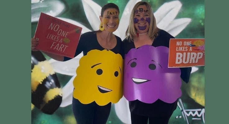 Photo of 2 teachers dressed up for book week as a burp (from 'No one likes a Burp') and a fart (from 'No one likes a fart').